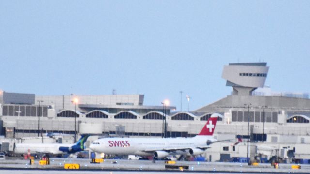 Airbus A340-300 (HB-JMA) - Departing the terminal for ,Zurich,Kloten(LSZH)"From a Distance!