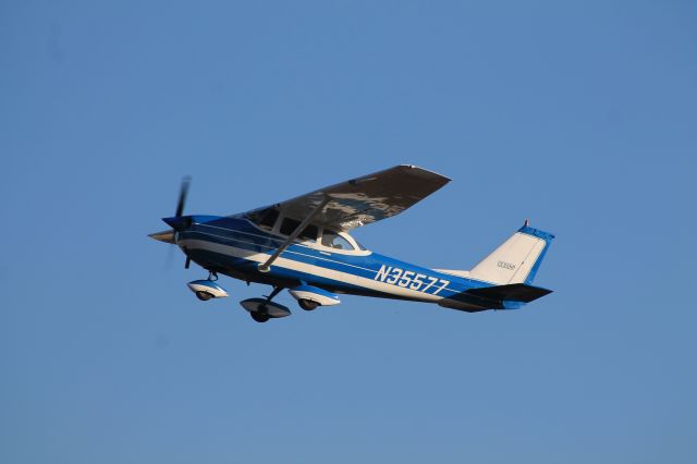 Cessna Skyhawk (N35577) - N35577 climbing after a runway 2 departure.