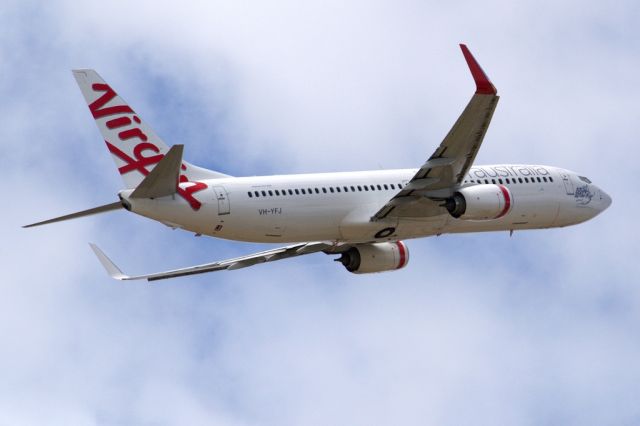 Boeing 737-800 (VH-YFJ) - Getting airborne off runway 23. Friday 1st February 2013.