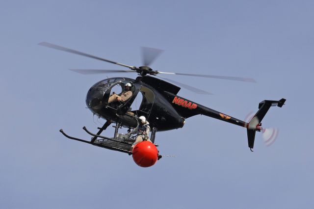 MD Helicopters MD 500 (N50AP) - Here’s a unique shot of N50AP, a Hughes 369D/MD500, operated by Haverfield Aviation. The crew was installing high-visibility overhead line markers on the utility lines, which span across the Maumee River. I spotted them as I travelled the Ohio Turnpike yesterday morning (26 Aug 2021). You think your job is hazardous; YIKES!!! 