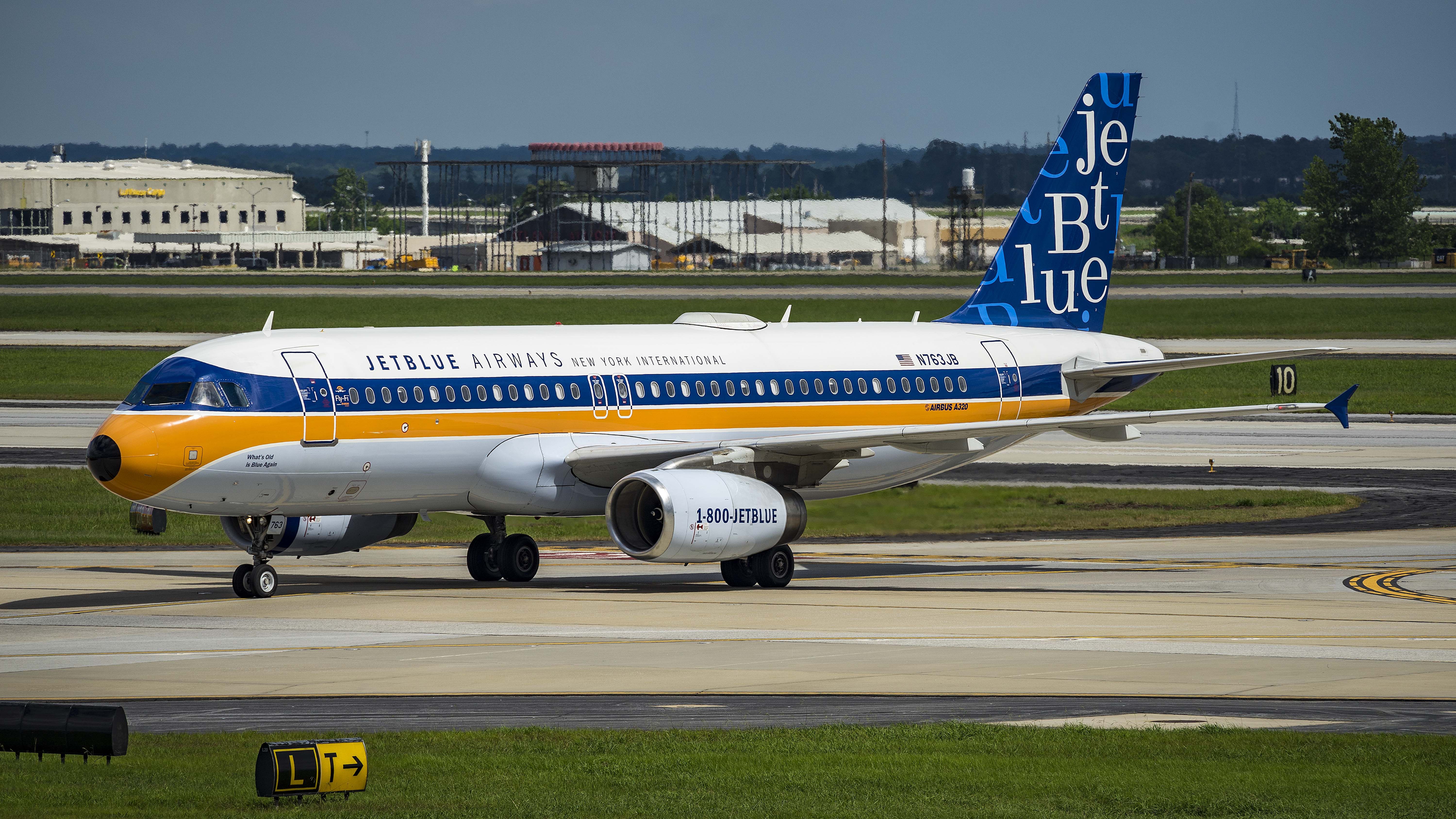 Airbus A320 (N763JB) - Retro Livery taxiing after arrival 27Lbr /6/18/17