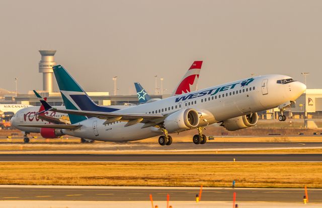 Boeing 737 MAX 8 (C-GRAX) - Operating as Westjet665 this brand new Max8 climbs off runway 23 and heads to Calgary