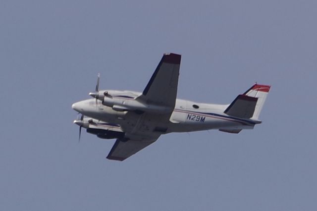 Beechcraft King Air 90 (N29M) - N29M flying out of KAQW Harriman and West (my old stomping ground) making several passes by the KFIT Fitchburg airport.