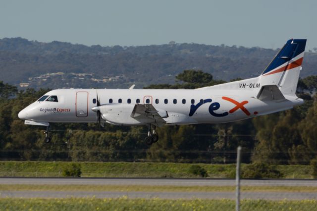 Saab 340 (VH-OLM) - About to put down on runway 05. Tuesday 22nd July 2014.