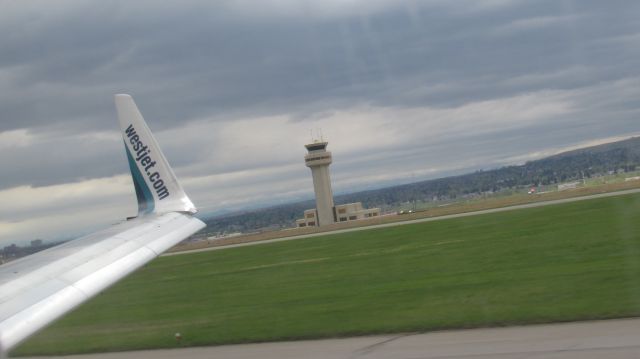 Boeing 737-700 (C-FWSF) - TOUCH DOWN RWY 32 MAY 19 2013 1500HRS MST.