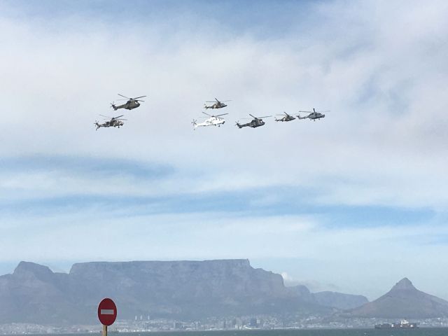 — — - Made in South Africa: 3 Atlas Oryx and 4 Denel Rooivalk. The white Rooivalk is in UN livery for service with UN peacekeeping forces in DRC.br /Armed Forces Day fly-past over Table Bay, Cape Town.3