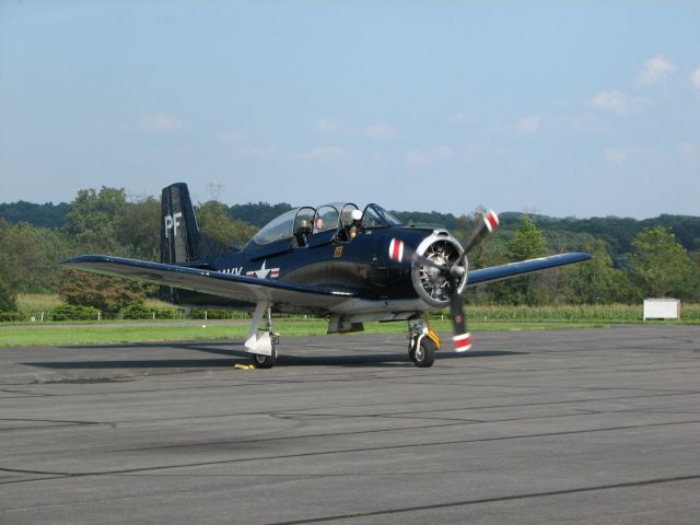 N555PF — - At Sky Manor, NJ    Giving a ride perhaps?    After departing, it circled the field, and did a low fly-by with the smoke on - nice!  (the people at the restaurant were outside watching too!)