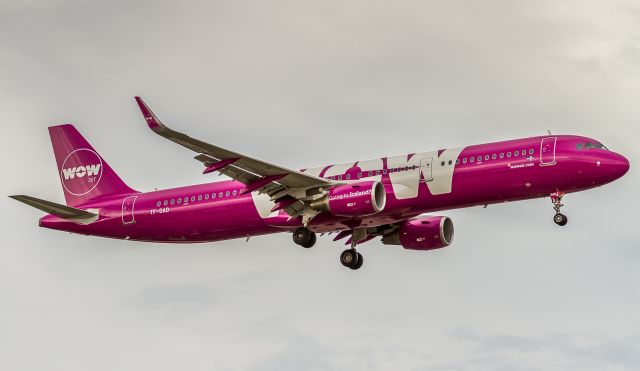 Airbus A321 (TF-DAD) - This WOW A321 was painted in reverse scheme (Purple lettering, white fuselage) but now shes repainted to match the rest of the fleet