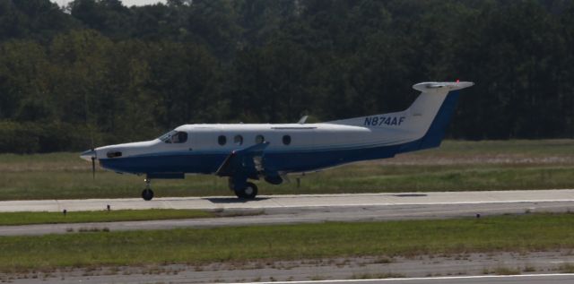 Pilatus PC-12 (N874AF) - Landing at KPDK on a day with a smog in the air.