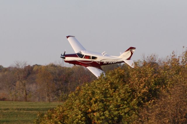 Piper PA-24 Comanche (N7920P) - Low pass over the grass strip.