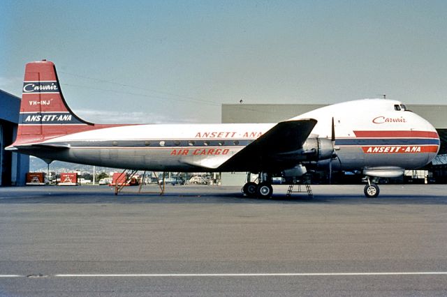 VH-INJ — - ANSETT ANA - AVIATION TRADERS ATL-98 CARVAIR - REG : VH-INJ (CN 19/42927) - ADELAIDE INTERNATIONAL AIRPORT SA. AUSTRALIA - YPAD 20/3/1974 35MM SLIDE CONVERSION USING A LIGHT BOX AND A NIKON P80 DIGITAL CAMERA IN THE MACRO MODE.