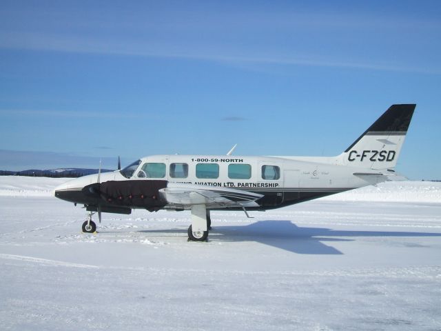 Piper Navajo (C-FZSD) - Parked at Northwind Aviation Hangar  at Goose Airport NL. Feb 17/09