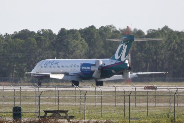 Boeing 717-200 (N977AT) - AirTran Flight 1049 (N977AT) arrives on Runway 6 at Southwest Florida International Airport following a flight from Dulles International Airport