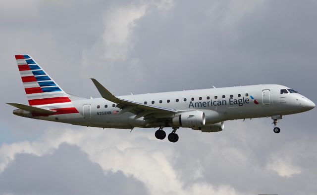 Embraer 175 (N258NN) - Id say this is quite the photogenic First Officer! (Please view in "full" for highest image quality)