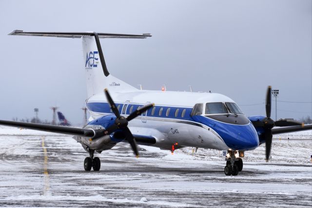 Embraer EMB-120 Brasilia (N126CZ) - FRE/ACE EMB-120 Brasilia taxiing into the Buffalo Niagara International Airport FBO, picking up the UB Women's Basketball Team 