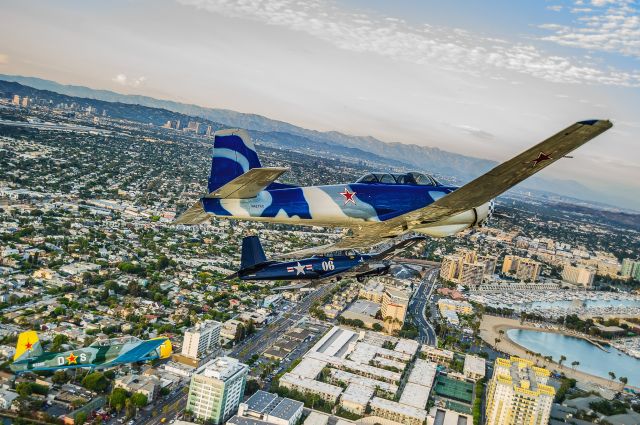 N427KC — - Urban Operations | Californiabr /br /Veterans Day, 2015. Red Star Pilots Associations Tiger Squadron departed from Torrance (KTOR) and conducted a fly-over and Missing Man formation over the Santa Monica Pier. This was the left hand turn after the fly-over to re-join for the Missing Man formation.br /br /© Bo Ryan Photography|a rel=nofollow href=http://www.facebook.com/BoRyanPhotohttps://www.facebook.com/BoRyanPhoto/a