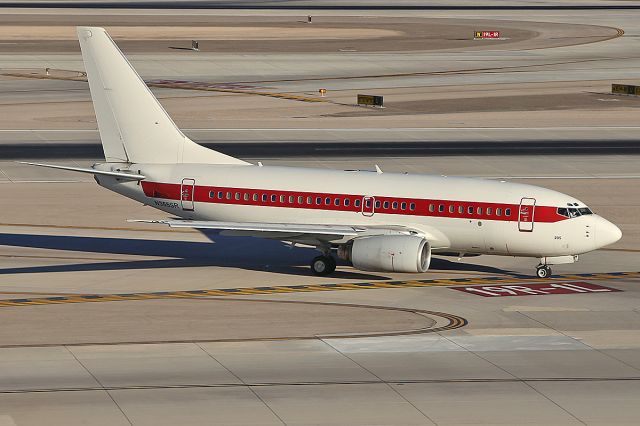 BOEING 737-600 (N365SR) - Taxiing after landing. Taken from a helicopter. 