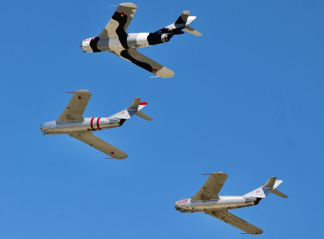 MIKOYAN MiG-17 (N6953X) - The MiG-17 trio flying in formation past show center. br /br /7/28/23