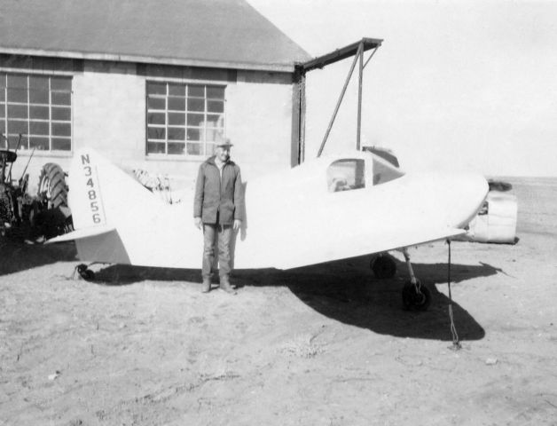 N34856 — - Glenn Putman, owner, shown after rebuilding this Cadet after purchase, approximately 1961. I’m peering out the side window. 