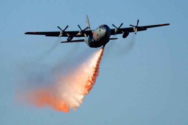 Lockheed C-130 Hercules — - MAFFS 7 flushing the tank before heading to California to replace a faulty system.