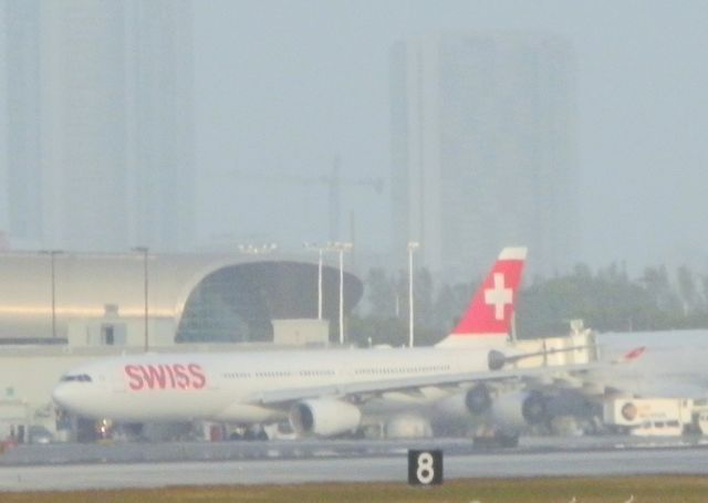 Airbus A330-300 (HB-JHA) - Departing the terminal,"For,"Zurich,Kloten(LSZH)"On a hazy afternoon!