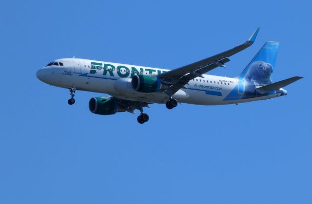 Airbus A320 (N238FR) - Shown here on approach is a Frontier Airbus A320 with a Tail full of Hugh the Manatee in the Summer of 2018.