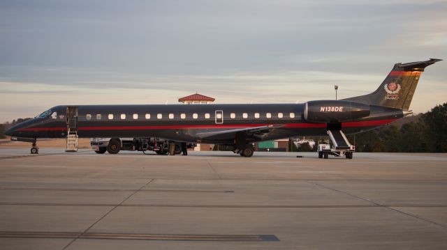 Embraer ERJ-145 (N138DE) - Dale Earnhardt's Champion Air waiting for some basketball team.