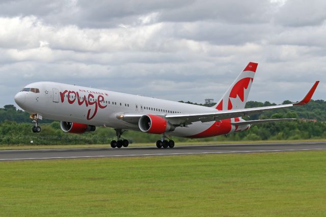 BOEING 767-300 (C-FMWV) - The summer brings Air Canada Rouge to Manchester.  Here ROU1931 starts the return flight to Toronto.