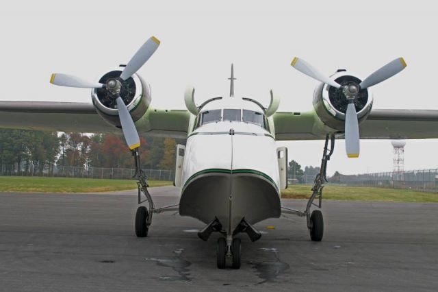 — — - Grumman Albatross on a fuel stop.