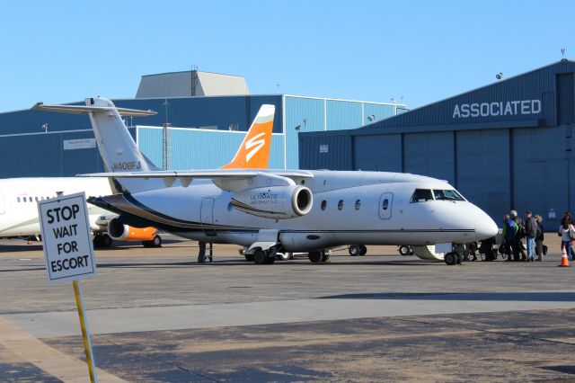 Fairchild Dornier 328JET (N406FJ) - Ultimate Air Shuttle (UE) N406FJ Do328-310 [cn3156] br /Dallas Love Field (DAL). Ultimate Air Shuttle flight UE301 boards passengers before departure to Taos Regional (TSM). Cincinnati, Ohio based Ultimate Air Shuttle provides charter air services.br /Taken from George Coker Circle, by northern perimeter fence alongside Runway 31R/13L.br /2018 12 20br /https://alphayankee.smugmug.com/Airlines-and-Airliners-Portfolio/Airlines/AmericasAirlines/Ultimate-Air-Shuttle-UE/