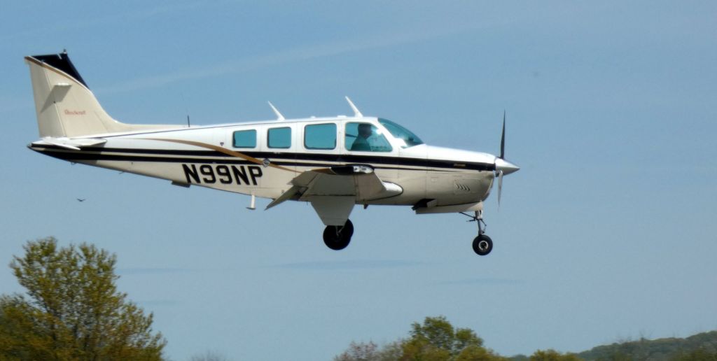 Beechcraft Bonanza (36) (N99NP) - On short final is this 1976 Beechcraft A36 Bonanza in the Spring of 2023.