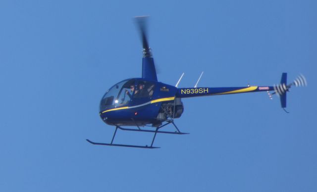 Robinson R-22 (N939SH) - Making a low pass is this 2005 Robinson R22 Beta rotorcraft in the Winter of 2019.