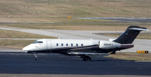 Bombardier Challenger 300 (N529FX) - Catching some Tarmac time is this 2006 Bombardier Challenger 300 in the Winter of 2019.