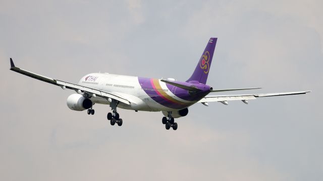 Airbus A330-300 (HS-TEO) - Thai airways A330 with one winglet on finals at Changi Airport 