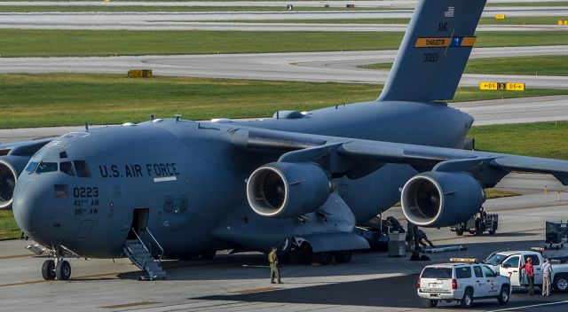 Boeing Globemaster III (10-0223) - Loading the last bit of cargo. Its amazing how fast they load it.