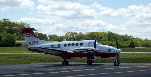 Beechcraft Super King Air 200 (N223TP) - Catching some tarmac time is this 1983 Beechcraft Super King Air 200 in the Spring of 2023.