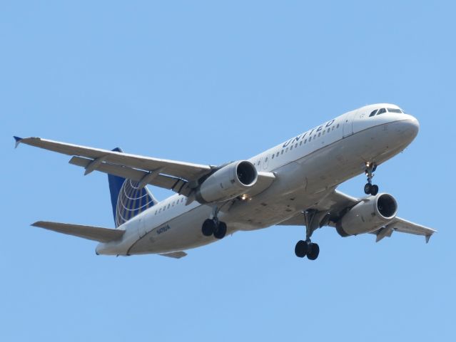 Airbus A320 (N478UA) - On final approach to SAN, seen over Balboa Park.