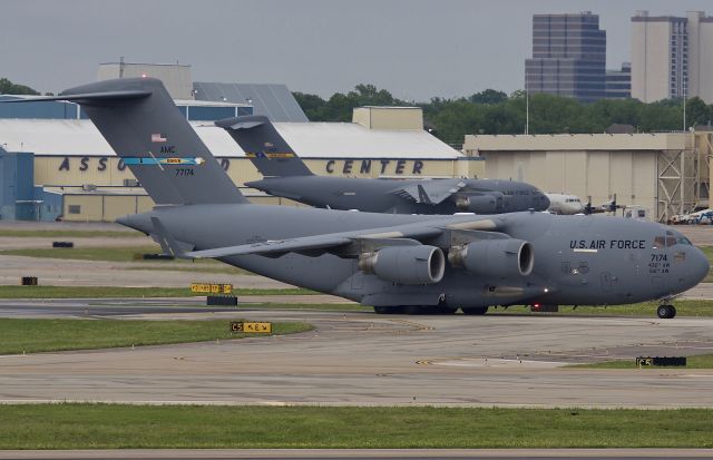 Boeing Globemaster III (07-7174) - Military traffic at Love Field is typically light. There have been P-3s based at Love since the mid 80s for radar testing and slowly P-8s have been replacing them. On this rare occasion both POTUS and VPOTUS visited Dallas leading to a pair of C-17s being on the ground. Was excited to catch both -17s and a P-3 all in one frame back in May 2018! Later in the afternoon a US Navy T-6 Texan II arrived making it the 4th military aircraft to be at DAL in 24 hours, talk about rare! (please view in "full" for highest image quality)