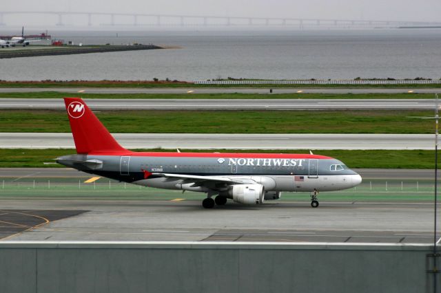 Airbus A318 (N311NB) - KSFO - Northwest A318 on taxi to the Terminal.