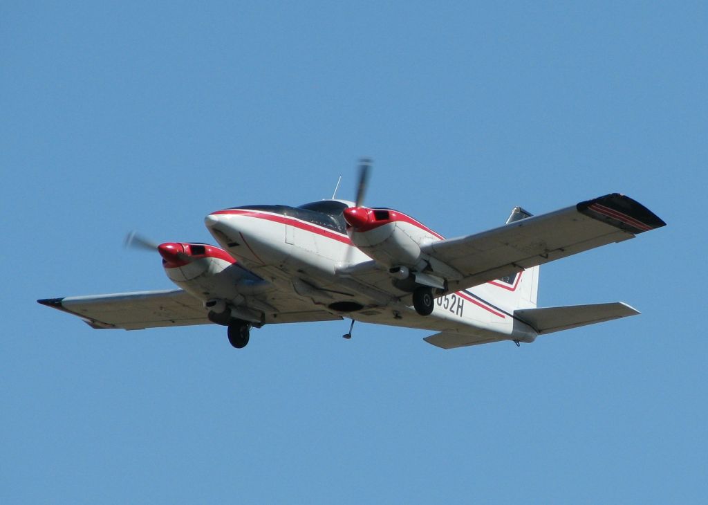 Piper Apache (N7052H) - Just took off from runway 32 at the Downtown Shreveport airport.