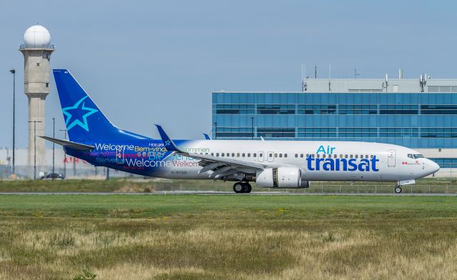 Boeing 737-800 (C-GTQG) - Slowing on runway 15R, this Air Transat 738 arriving from Fort Lauderdale as TSC859