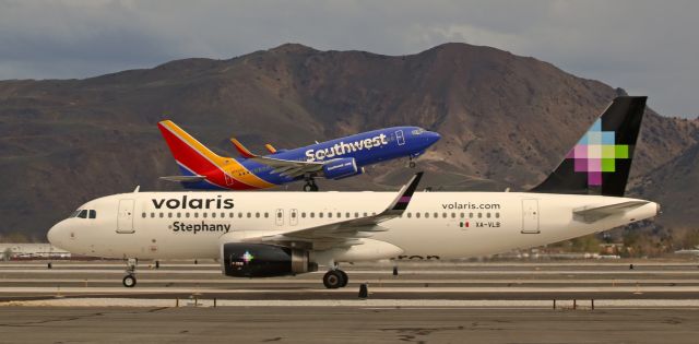 Airbus A320 (XA-VLB) - "Taxiing north; departing south."  As VOIs "Stephany" (XA-VLB, an A320) rolls north along taxiway Alpha after landing on RTIAs runway 16R, SWAs N7834A climbs out from the same runway.  