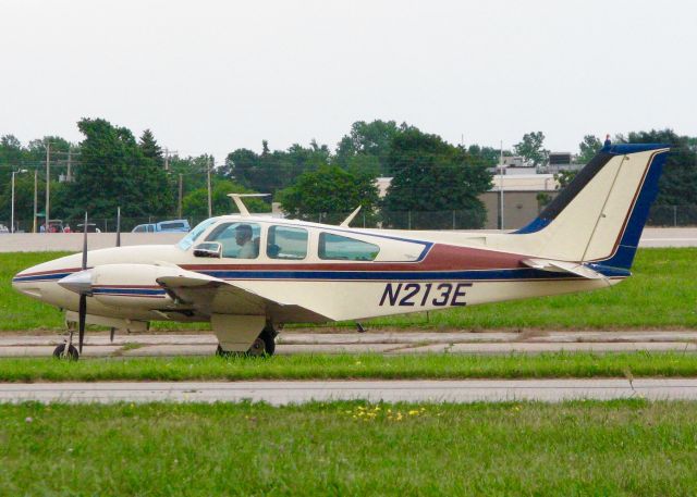 Beechcraft 55 Baron (N213E) - At Oshkosh. 1965 Beech 95-C55