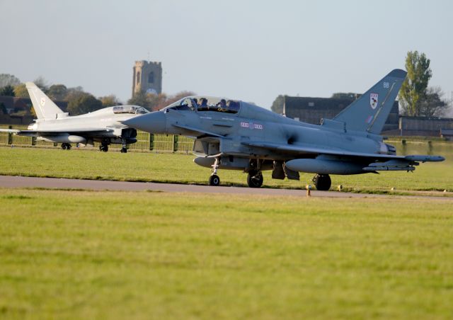 — — - A pair of " Euro Fighters " TYPHOONS to me... taking off on a training flight...