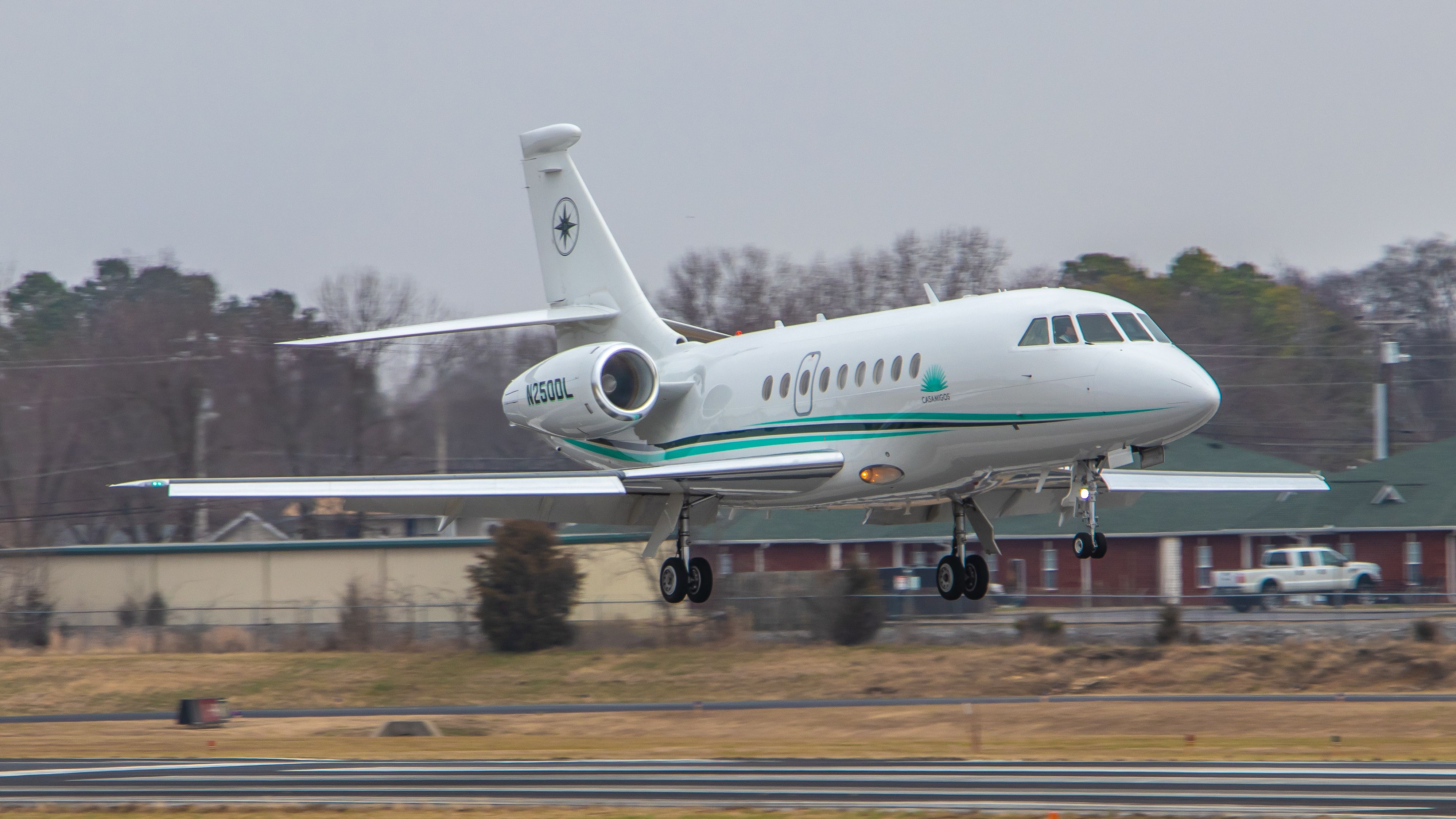Dassault Falcon 2000 (N250DL) - January 16, 2019, Lebanon, Tennessee -- Tequila anyone?  This Falcon 2000 bearing the "Casamigos" Tequila logo is arriving on runway 19.