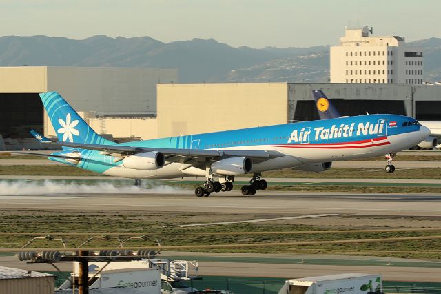 Airbus A340-300 (F-OLOV) - Touch down. 