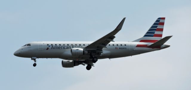 EMBRAER 175 (long wing) (N424YX) - Moments before landing, spring 2019.