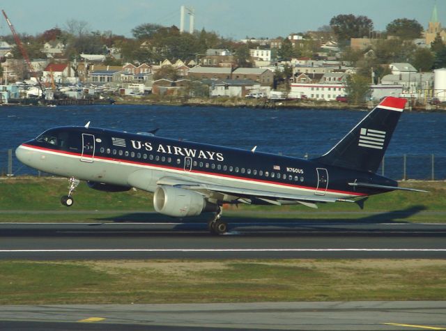 Airbus A319 (N760US) - USAirways A-319 N760US touches down on Runway 31 at KLGA on a very, very windy Oct 29, 2006 !