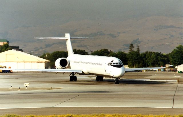 McDonnell Douglas MD-90 (N903RA) - KSJC- after the AA/Reno Air merger- various paint schemes were seen at KSJC and other airports. This jet rolling to 30 L for a departure to KSNA
