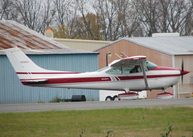 Cessna Skylane (N226AC) - Taking off from the Downtown Shreveport airport. Notice the small co-pilot.